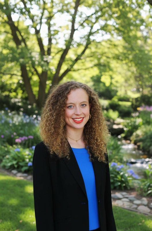 Kristine Johnson, LCSW, smiling outdoors